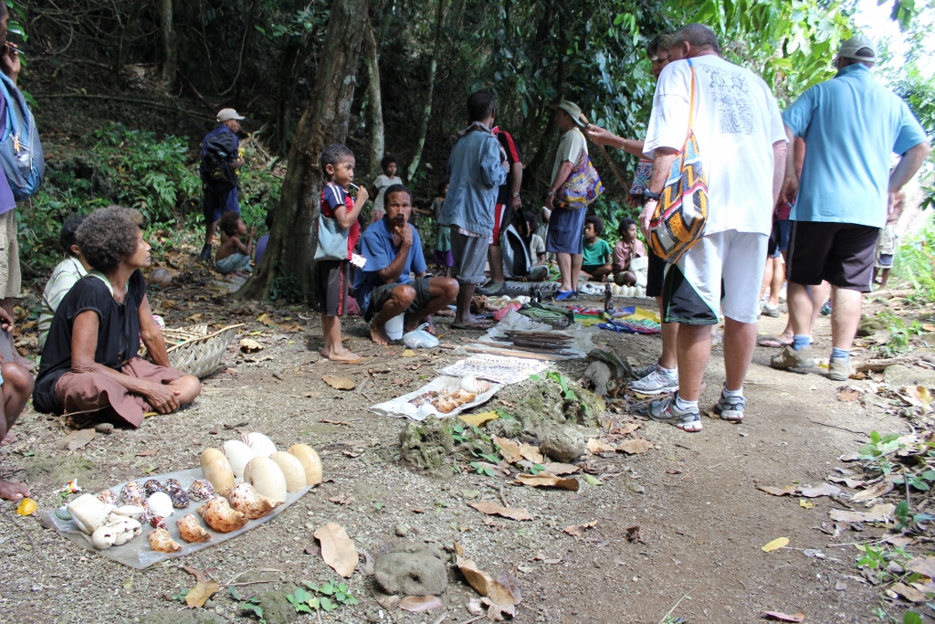 Selling their wares outside one of the skull caves.