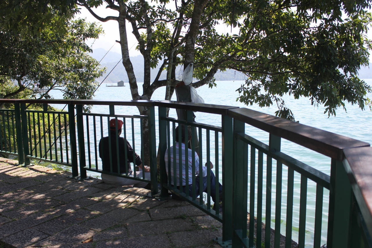 Men Fishing from the lake bank